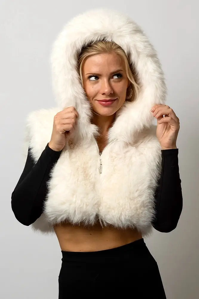 Aurora Halo Premium LED Vest in white faux fur. Women's cropped hooded festival vest worn over a black outfit perfect for rave gear.
