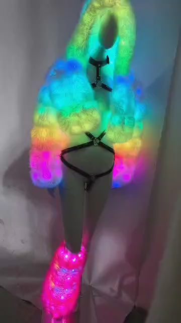 video showing the leggings and sugarfur coat LEDs on and glowing 