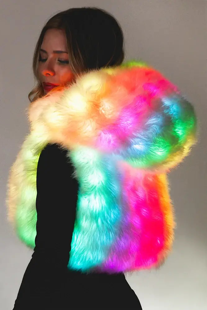 Aurora Halo LED vest shown with lights turned on in rainbow color mode perfect for festivals like burning man.