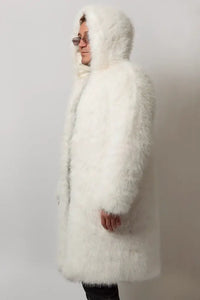 male model from the side wearing a white faux fur festival coat for men, the SugarFur Snow Angel, shown unlit.