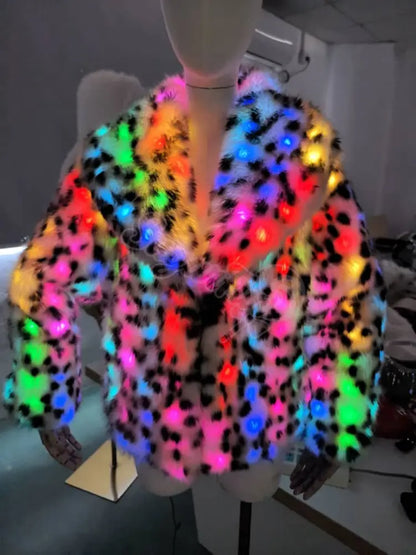 Mannequin wearing a colorful, illuminated jacket with LED lights.