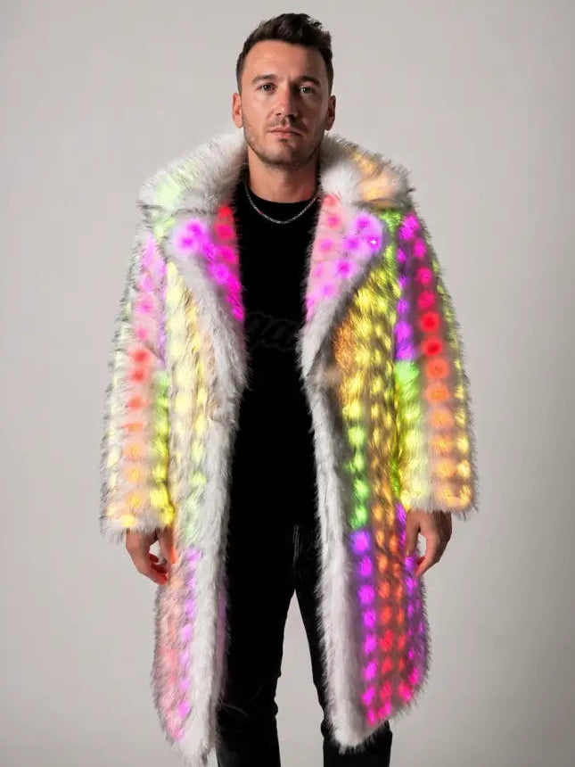 Man wearing a colorful, illuminated fur coat against a plain background